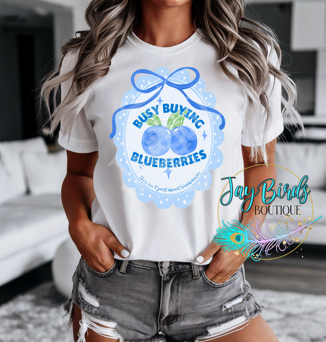 Busy buying blueberries Solid tee
